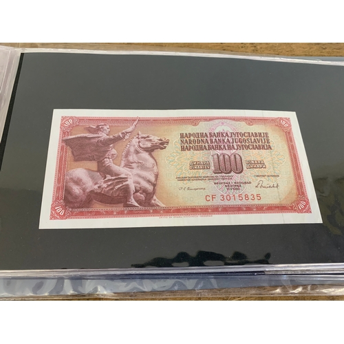 301 - An album of mixed bank notes, Japanese and Chinese WW2 with others