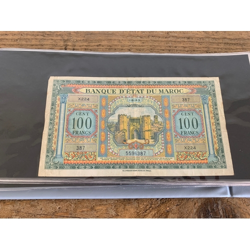 302 - An album of mixed bank notes, French, German plus others