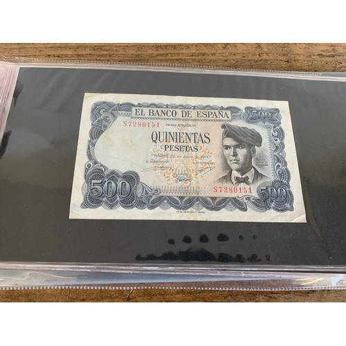 302 - An album of mixed bank notes, French, German plus others