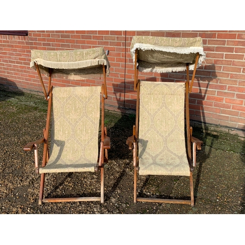 316 - Two vintage cloth steamer deck chairs with canopies