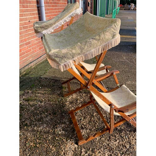 316 - Two vintage cloth steamer deck chairs with canopies