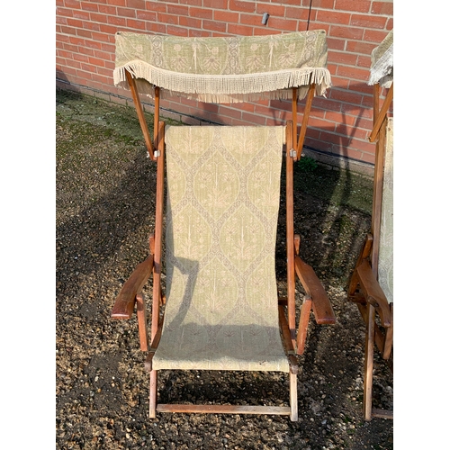 316 - Two vintage cloth steamer deck chairs with canopies