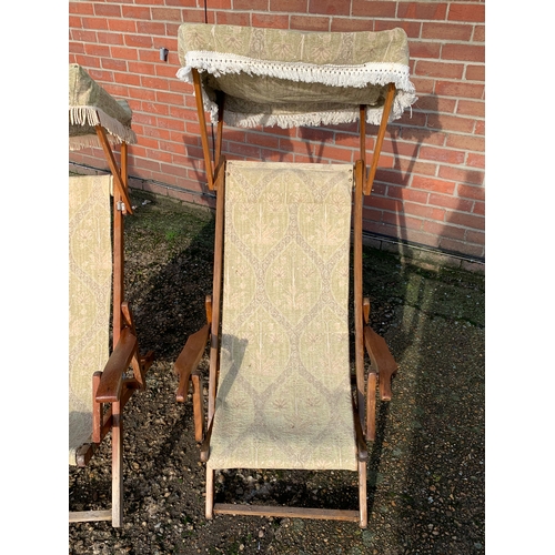 316 - Two vintage cloth steamer deck chairs with canopies