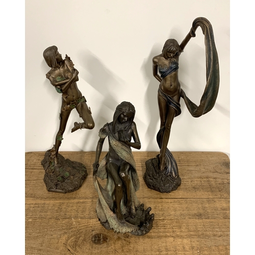 323 - Three resin female figurines, the tallest 19