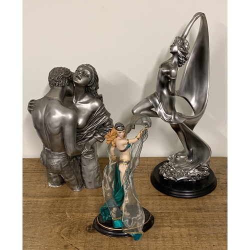 324 - Three resin female figurines, the tallest 18 1/2