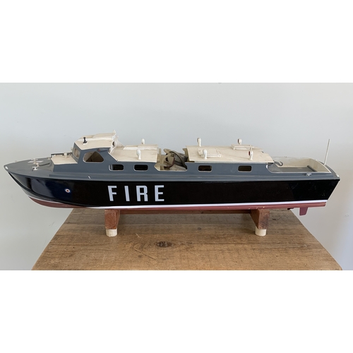 59 - A vintage radio controlled Fire boat, 35