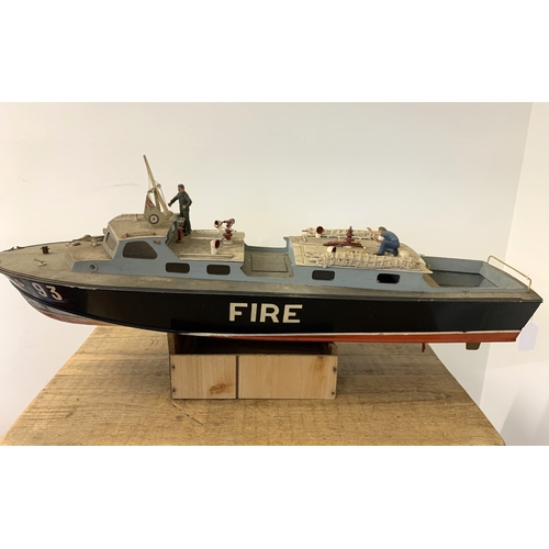 63 - A vintage radio controlled Fire Boat (inside as found, no controller), 36