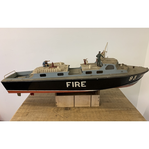 63 - A vintage radio controlled Fire Boat (inside as found, no controller), 36