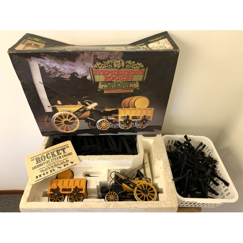 65 - A boxed Hornby Stephensons Rocket Real Steam Train Set with extra track (box with age related wear)