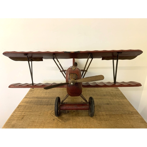 71 - A large model of an aeroplane with pilot, approx. 28