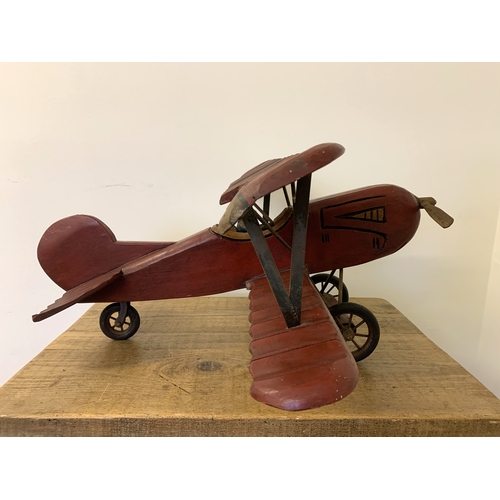 71 - A large model of an aeroplane with pilot, approx. 28