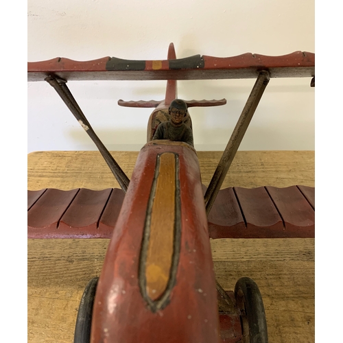 71 - A large model of an aeroplane with pilot, approx. 28