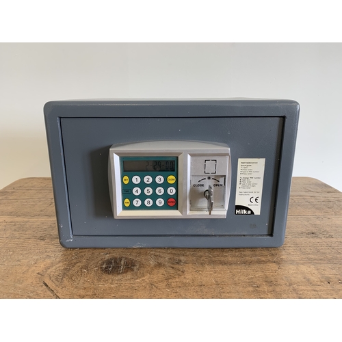 89 - A small 'Hilka' safe, digital display with key