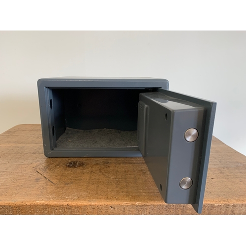 89 - A small 'Hilka' safe, digital display with key