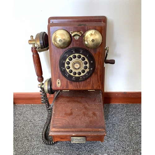 98 - A vintage novelty wall mounted telephone