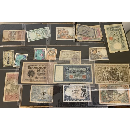 302 - An album of mixed bank notes, French, German plus others