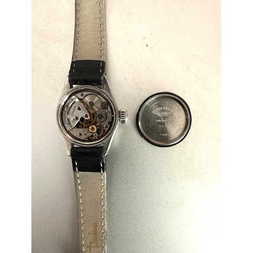 110 - A Tudor Oyster Royal ladies wristwatch with manual movement on black leather strap, 22mm diameter (n... 