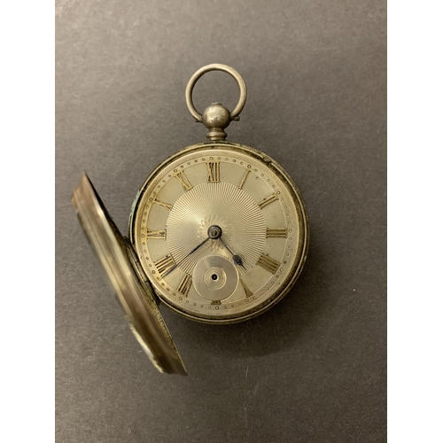 113 - An antique silver pocket watch (cracked crystal, no second hand)