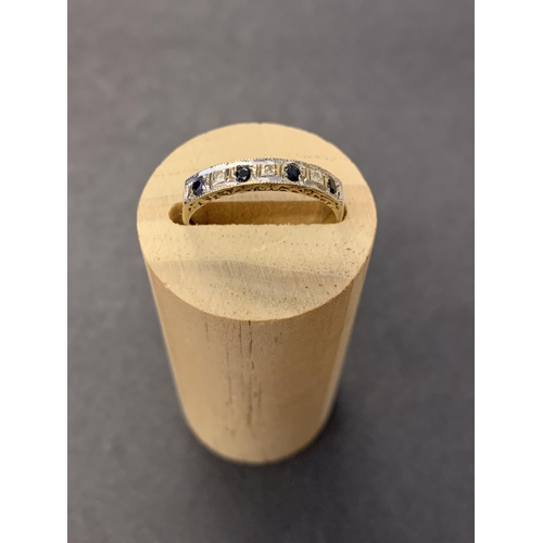 A 9ct gold ring with diamond and sapphire setting, approx. size Q, weight approx. 1.6g