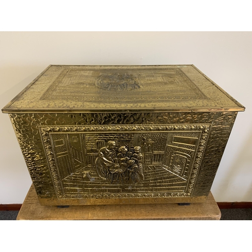 205 - A large brass embossed log box, 23