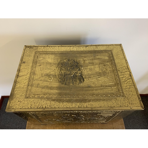 205 - A large brass embossed log box, 23