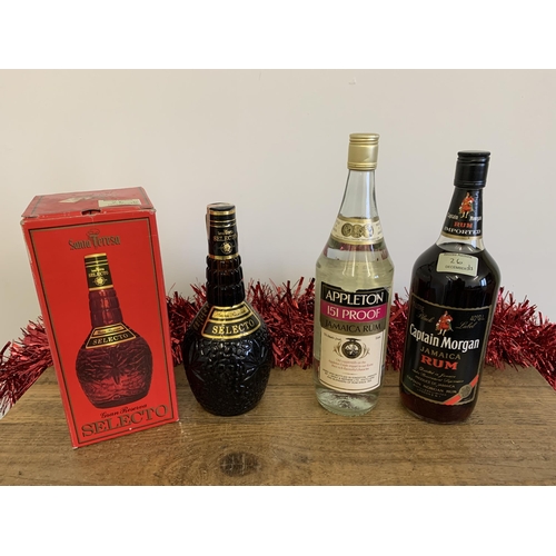 26 - A one litre Appleton 151 proof Jamaica rum plus a boxed Santa Teresa Venezuelan rum and a Captain Mo... 