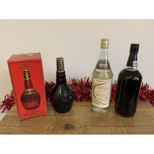 26 - A one litre Appleton 151 proof Jamaica rum plus a boxed Santa Teresa Venezuelan rum and a Captain Mo... 