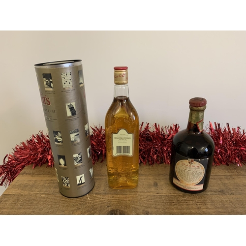 37 - A boxed William Grant's Millennium 70cl whisky plus a vintage Drambuie liqueur