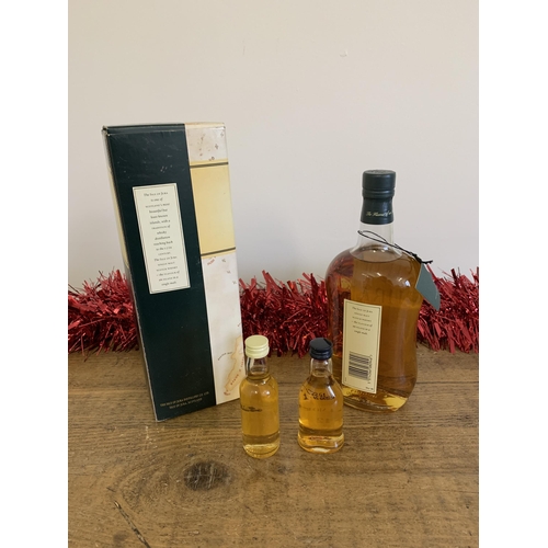 45 - A boxed Isle of Jura 70cl whisky, contains two miniatures 'The Dalmore' and 'The Bruichladdich'