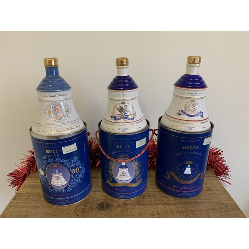 54 - Three cannistered Bell's bell 75cl porcelain Royal commemorative decanters, Princess Beatrice 1988, ... 