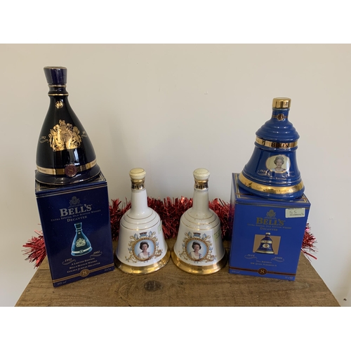 55 - A boxed Bell's bell 70cl 2002 Golden Jubilee decanter, a boxed 2001 Her Majesty 75th birthday plus t... 