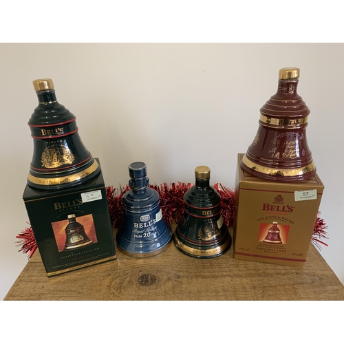 57 - Two boxed Bell's bell Christmas decanters, 1993 and 1999 plus two unboxed 70cl