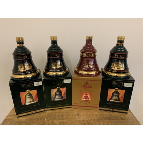 58 - Four boxed Bell's bell ceramic decanters, Christmas year issues includes 1992, 1994, 1995 and 1999, ... 