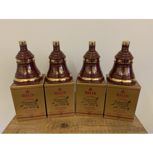 61 - Four boxed Bell's bell ceramic year decanters, all 1999