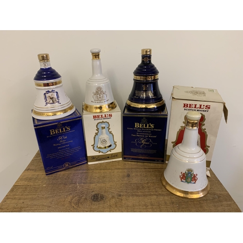 63 - Four Royal commemorative Bell's bell decanters including 1986 Andrew and Fergie, 1982 Birth of Willi... 