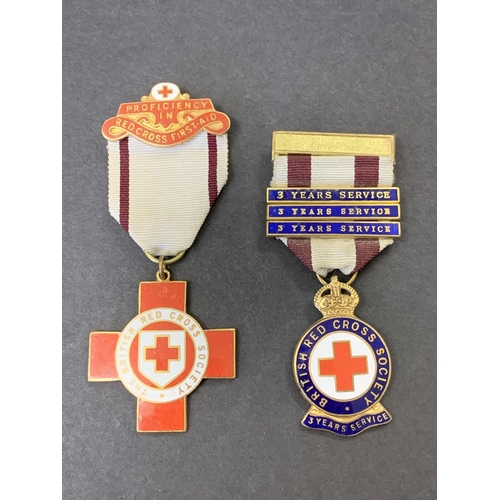 86 - A vintage Red Cross 3 year service medal with three additional 3 year service bars plus a Red Cross ... 