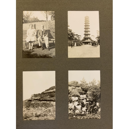 98 - An early 20th Century photograph album, well filled, a vintage Michelin Tyres 'Battle of Normandy' m... 