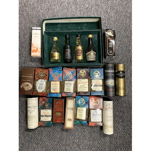 52 - A good large selection of whisky miniatures, mainly Scottish but includes American bourbon and whisk... 