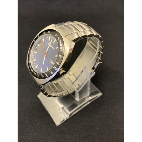 244 - A DKNY designer gents wristwatch (running at the time of lotting)