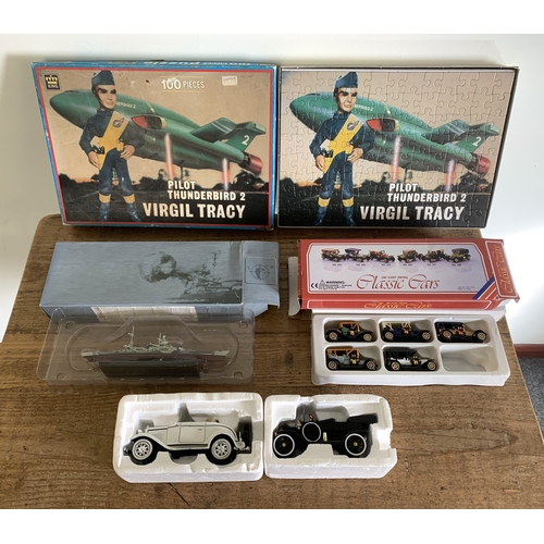 305 - A mixed lot on vintage toys to include a Thunderbirds puzzle, Atlas Ship Collectors cars etc