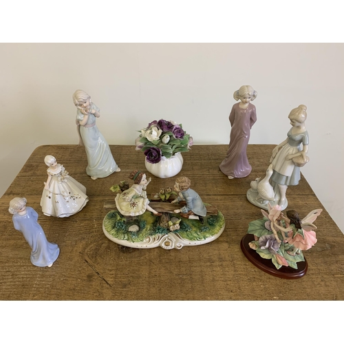 306 - A selection of ceramic figurines of girls plus a Royal Adderley flower posie