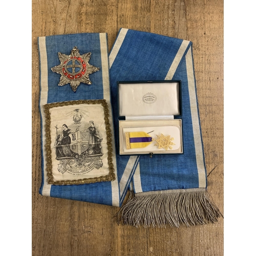 302 - A boxed Masonic First Degree breast jewel plus a Freemasons sash