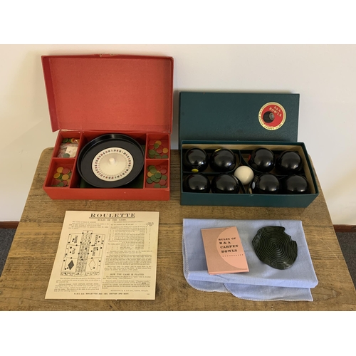 11 - Boxed 'B & A' indoor carpet bowls plus a boxed mini roulette game