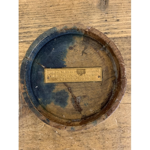 116 - A small lead lined barrel marked 'Made from the Teak of H.M.S. Iron Duke Admiral Jellicoe Flag Ship ... 