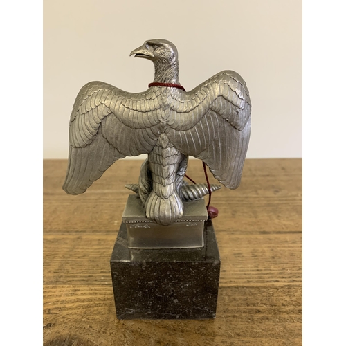 121 - A small Napoleonic eagle on a stand, 7