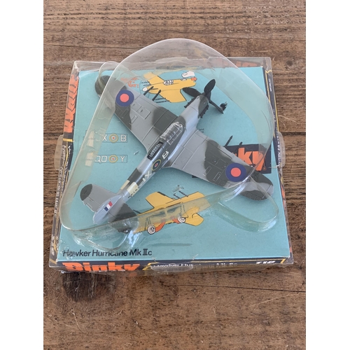 143 - A Dinky Toys boxed Hawker Hurricane MK IIc 718 (box and plastic with age related wear)