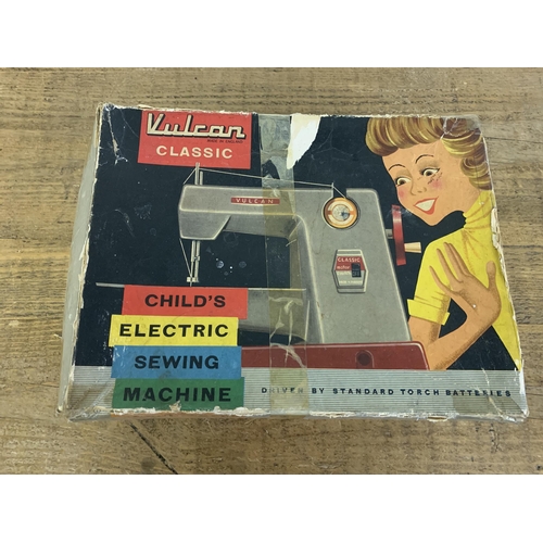 162 - A vintage Vulcan Classic child's electric sewing machine, battery driven in original box (signs of a... 