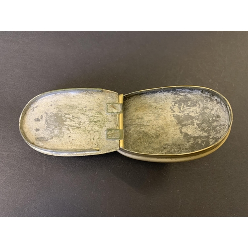 186 - A 19th Century brass snuff box engraved to the top 'W.Cowan' etc, curved body, 3