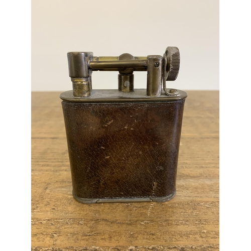 254 - A vintage Brevette Classic jumbo table lighter, covered in a leather type material, made in England ... 