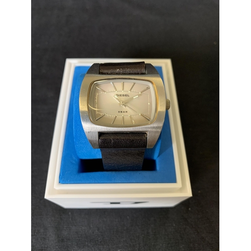 266 - A boxed Diesel designer wristwatch